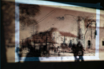 Stop-motion animation with charcoal on a projection of a postcard from Prishtina, Kosovo - Bournemouth Visit 2019